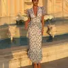 Traje de Dos Piezas Elegante Nuevo con Estampado Digital Francés, Top de Cuello en V con Mangas Abullonadas y Falda