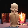 Pequeno sofá reclinável Maitreya ornamentos de lazer armário de TV doméstico decorações interessantes chinesas artesanato de resina fabricantes atacado