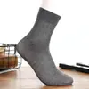 Meias finas de verão masculinas de negócios absorventes de suor retas descartáveis de algodão mercerizado de tubo médio Meias de aço masculinas meias masculinas atacado