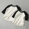 Camiseta de Algodón Puro para Niños con Mangas Tres Cuartos, Top de Algodón con Cuello Redondo y Mangas Raglán para Niños y Niñas, Broche en el Hombro para Niños, Estilo Primavera y Otoño
