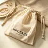Bolsas ligeras de fibra de bambú con cordón para joyería, coleccionables y productos de fragancia; Impresión de logo personalizada disponible para empaques de regalo de marca