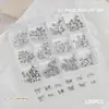 Accesorios para Uñas Artísticas Caja de 12 Compartimentos Mariposa Metálica Mixta Cuervo Corazón Cruz Cinta Lazo Decoración para Uñas de Forma Especial