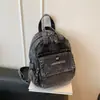 Nueva bolsa de hombro y bandolera de mezclilla de moda transfronteriza, mochila casual versátil, bolso pequeño multicapa ligero para mujer