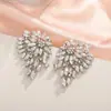Brincos de temperamento requintado transfronteiriços Europa e Estados Unidos liga incrustada com diamante colorido brincos irregulares moda de trabalho feminino joia de orelha para todas as ocasiões