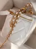2025 Nuevo Estilo Inspirado en Chanel Piel de Cordero Bola Dorada Caja Suave Estuche de Maquillaje Acolchado Cadena Bolso de Hombro Cruzado para Mujer