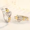 Deseo comercio exterior venta caliente moda amor hebilla de oreja incrustaciones de diamante geométricos huecos forma de corazón de melocotón aretes aro de oreja aretes al por mayor