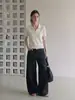 Polo retro clásico blanco, nuevo estilo primavera-verano, adecuado para figuras petite, con diseño de hombro recto, versátil y elegante, top de punto de manga corta