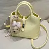 2026 Bolso Cubo Nuevo para Mujer de Gama Alta Versátil de Mano y Cruzado Estilo Lujo Ligero Moda para el Trabajo Bolso de un Solo Hombro