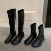 Outono/Inverno 2026 Novas Botas Meia Bico Redondo Elástica Femininas Botas Emagrecedoras Fundo Plano Aumentadoras de Altura Temperamento Versátil Puxar para Vestir Cano Alto Botas Longas
