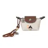 Mini Bolso Lindo para Mujer con Diseño de Nicho, Bolso Dumpling, Monedero, Portamaquillaje, Estuche para Auriculares, Llavero, Colgante para Bolso, Bolso Croissant