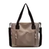 Nuevo bolso de mano ligero de nailon transfronterizo para mujer, estilo coreano y japonés, bolso de hombro de gran capacidad, bolso cruzado de moda para el día a día