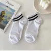 Calcetines Unisex Negros y Blancos de Primavera y Otoño, Calcetines de Longitud Media Versátiles de Color Sólido, Absorbentes del Sudor y Resistentes al Olor, Calcetines Zhuji, Calcetines Bajos