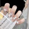 B522 Té Helado Mariposa Blanca Trapecio Largo Avanzado Hecho a Mano Fototerapia Uñas Portátiles Camelia Mariposa Perla Pequeña Decorativa Manicura