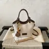 Nova bolsa feminina transfronteiriça, bolsa de balde nicho de alta qualidade 2026, bolsa de ombro e transversal versátil e moderna, bolsa de mão fashion