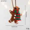Novo cachecol de pelúcia de Natal com laço e pingente em formato de boneco de gengibre, decoração de atmosfera natalina para festas