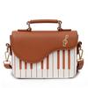 Bolsa Cuadrada Pequeña de Moda de Venta Caliente Transfronteriza Bolso de Mujer Nuevo Bolso de Hombro PU con Notas de Piano Bolso Cruzado Dulce Portátil para Mujer