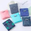 Bolsas de compras portátiles ecológicas al por mayor del fabricante, bolsas de compras para tiendas de ropa, bolsos de mano, bolsas de compras plegables de tela Oxford