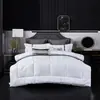 Calidad de hotel cinco estrellas, 100% algodón, impermeable, relleno de plumón, diseño a cuadros, edredón de invierno, engrosado, blanco puro, adecuado para casas de huéspedes