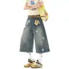 Pantalones casuales de pierna ancha para hombre, pantalones cortos cropped con estampado de estrellas vintage lavado, shorts de mezclilla rotos estilo americano holgados desgastados para hombre