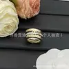 Nuevo modelo exclusivo transfronterizo de Xiangjia, réplica de alta calidad con logo, anillo triple con letra C doble incrustada de diamantes, venta al por mayor
