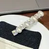 Pinza para el cabello de alta gama con forma de corazón de perla, pinza de pico de pato para flequillo lateral, pinza lateral de figura de ocho con pedrería para mujer