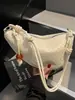 Bolsa com Padrão Trançado para Mulheres 2026 Nova Bolsa de Ombro/Axila de Nicho Bolsa Transversal Fashionável Versátil Bolsa de Selim de Alta Qualidade