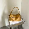 Bolso transfronterizo de diseño nicho estilo coreano nuevo, bolso de axila, bolso multi-bolsillo para commuting, bolso de hombro y cruzado moderno y versátil