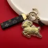 Ano do Carneiro Dourado Chaveiro Carneiro da Sorte Corrente de Celular Bolsa Pingente Dourado Presente Comemorativo Atacado