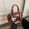 Cross-border high-end western style bag feminino 2025 novo nicho retro bolsa de ombro crossbody all-match bolsa de travesseiro portátil