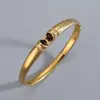 Pulseira Transfronteiriça Europeia e Americana de Aço Inoxidável Titânio Pedra Olho de Tigre Pulseira de Casal Simples Versátil Fashion Elegante Pulseira Aberta