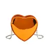 Bolso de cadena transfronterizo para niños 2026 nuevo estilo bolsito de hada corazón monedero con forma de corazón bolso mini moderno lindo sobre rojo para mujeres