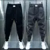 Calças casuais de inverno masculinas estilo coreano calças esportivas da moda com forro de lã calças da moda de nove comprimentos calças elásticas masculinas