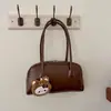 Bolsa de axila feminina de nicho transfronteiriça 2026 nova bolsa de mão retrô da moda bolsa bowling grande capacidade bolsa de mão para o dia a dia