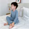 Roupa de Casa Infantil Roupas e Calças de Outono Infantis Meninos e Meninas Roupa de Casa para Bebê Malha Térmica de Algodão Pijamas Roupa de Casa Engrossada