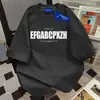 Camiseta Feminina de Manga Curta com Estampa de Letras da Marca Americana Ins Tendência Verão 2025 Casual Solta Moda Versátil Gola Redonda