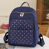 Otoño e Invierno nuevo tejido de nailon remache mochila pequeña fresca transpirable bolso de mujer mochila entrega directa de fábrica