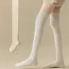 Meias femininas outono e inverno novas meias altas cor sólida costura japonesa meias até o joelho casuais Joker fábrica atacado