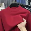 Suéter de cuello alto cruzado al por mayor para hombre, nuevo estilo otoño e invierno 2026, camiseta básica de punto versátil de color liso para hombres de mediana edad