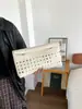 Bolso tejido hueco de moda para mujer, nuevo modelo 2026, monedero de gran capacidad, bolso de mano de moda, bolso tipo sobre único