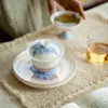 Estilo Dinastía Tang y Song Arcilla de Jade Porcelana Azul y Blanca Peonía Elegante Cerámica para el Hogar Gaiwan Juego de Té Kung Fu Taza de Té Gaiwan de Pared Delgada