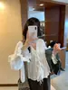 Top con cordones 2026 Primavera y Otoño Estilo Nuevo Blanco Estilo Francés Ligeramente Transparente Diseño de Nicho Chaqueta para Niñas