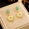 Pendientes irregulares de estilo europeo y americano de mediados de la antigüedad con diseño de sol turquesa retro, pendientes geométricos ovalados de acero y titanio.