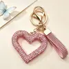 Novo chaveiro em forma de coração oco com diamantes, acessório de argila com diamantes completos, decoração para bolsa feminina, pingente para interior de carro