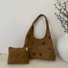 Bolso Cruzado de Cuero Mate con Flor Hueca de un Solo Hombro para Mujer 2026 Otoño Nuevo Pequeño de Nicho para Viajar Gran Capacidad Bolso de Mano