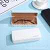 Caja para lentes de estudiante al por mayor para hombre y mujer, simple, portátil, de cuero de alta calidad mercerizado, fresco, ins, anti-presión, para guardar lentes
