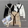 Nueva colección de principios de otoño: un top de punto largo, de manga larga, nicho, elegante y versátil con cuello chal, corte ajustado y una silueta favorecedora, perfecto para un look chic y casual