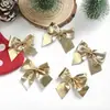 Novas decorações de árvore de Natal em laço nas cores duplas vermelho e dourado/vermelho e prata, uma ferramenta mágica para criar uma atmosfera festiva