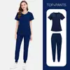 Conjunto de Uniforme Quirúrgico de Color Sólido de Dos Piezas con Cuello Abierto y Media Cremallera Uniforme de Trabajo Hospitalario Uniforme de Enfermera Multicolor Venta al por Mayor