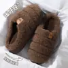 Pisar caca sentir zapatillas de algodón para mujer otoño invierno 2026 nuevo hogar interior suela gruesa con terciopelo zapatos de algodón cálidos para hombre al por mayor
