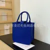 Nuevo Bolso de Mano de Fieltro de Dibujos Animados Bolso Tote Souvenir de Boda para Bebé Bolsa de Fieltro Bolsa de Regalo de Promoción Publicitaria